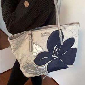 Nine west - silver and navy floral themed purse.